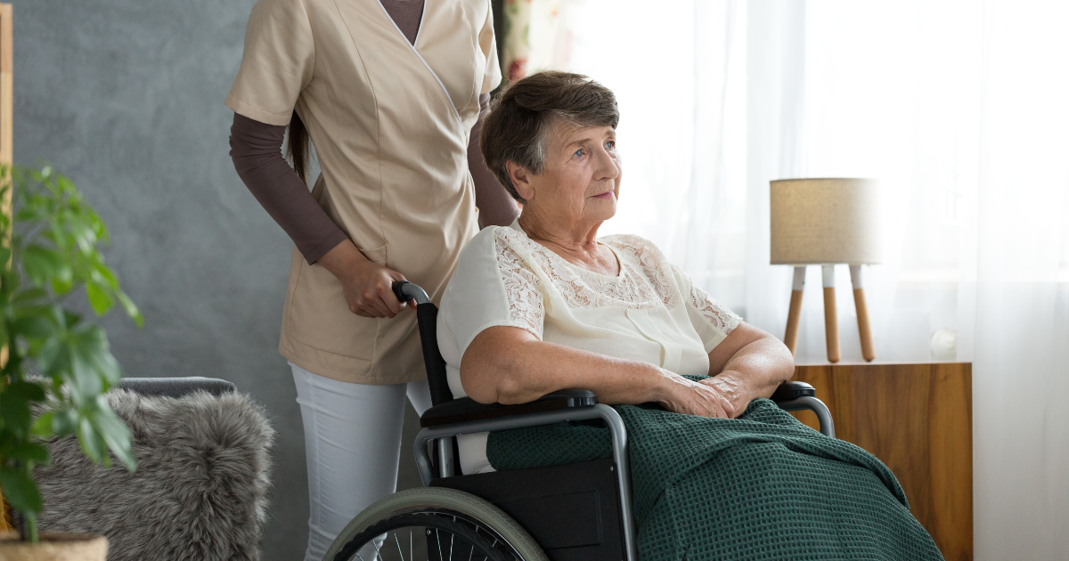 A woman on a wheelchair deals with Alzheimer's Disease.