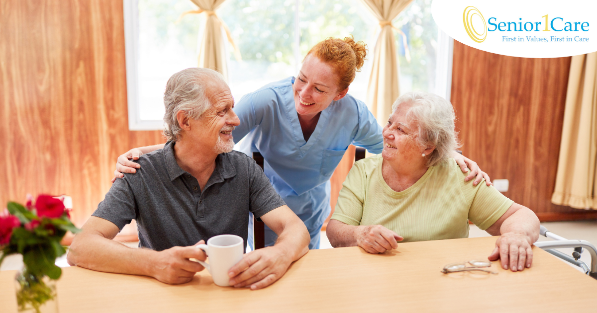 A good caregiving environment can benefit both caregiver and clients, as shown here by this caregiver and her 2 clients.