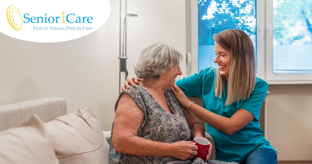 A home care provider compassionately tends to a senior client in their home.