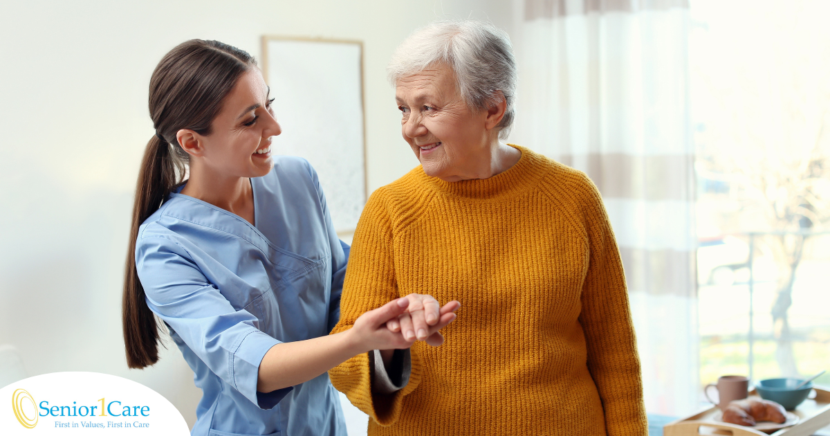 Professional caregivers, like this one who is helping a senior client walk, require a number of qualities and skills to provide compassionate personal care.