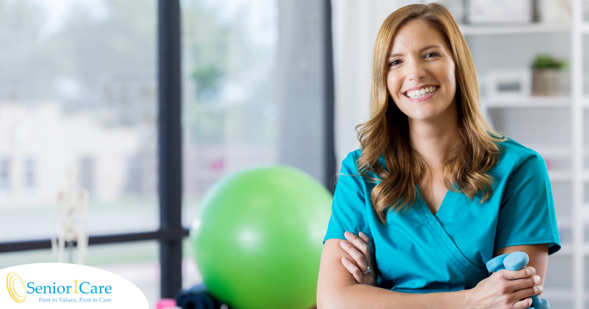 A physical therapist smiles as a result of enjoying her career.