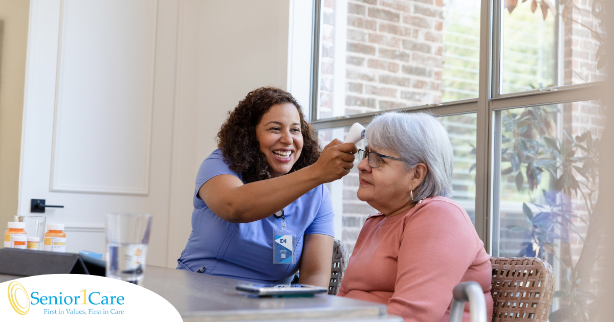 A woman working in home health care gladly takes vitals for a senior patient.