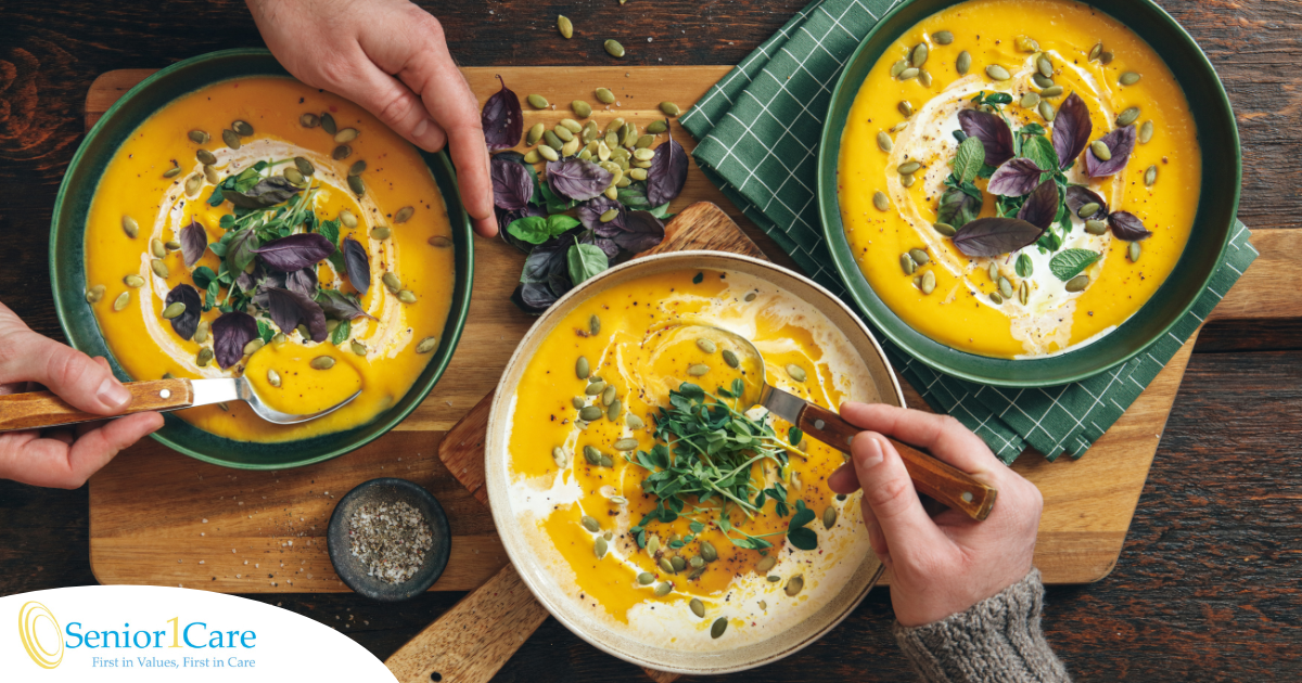 Pumpkin soup like the one in these bowls can be a great choice for a winter food for older adults.