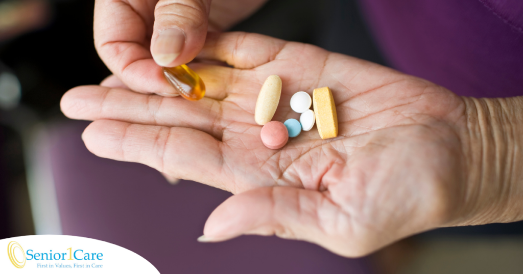 A woman holds pills in her hand, representing medication management.