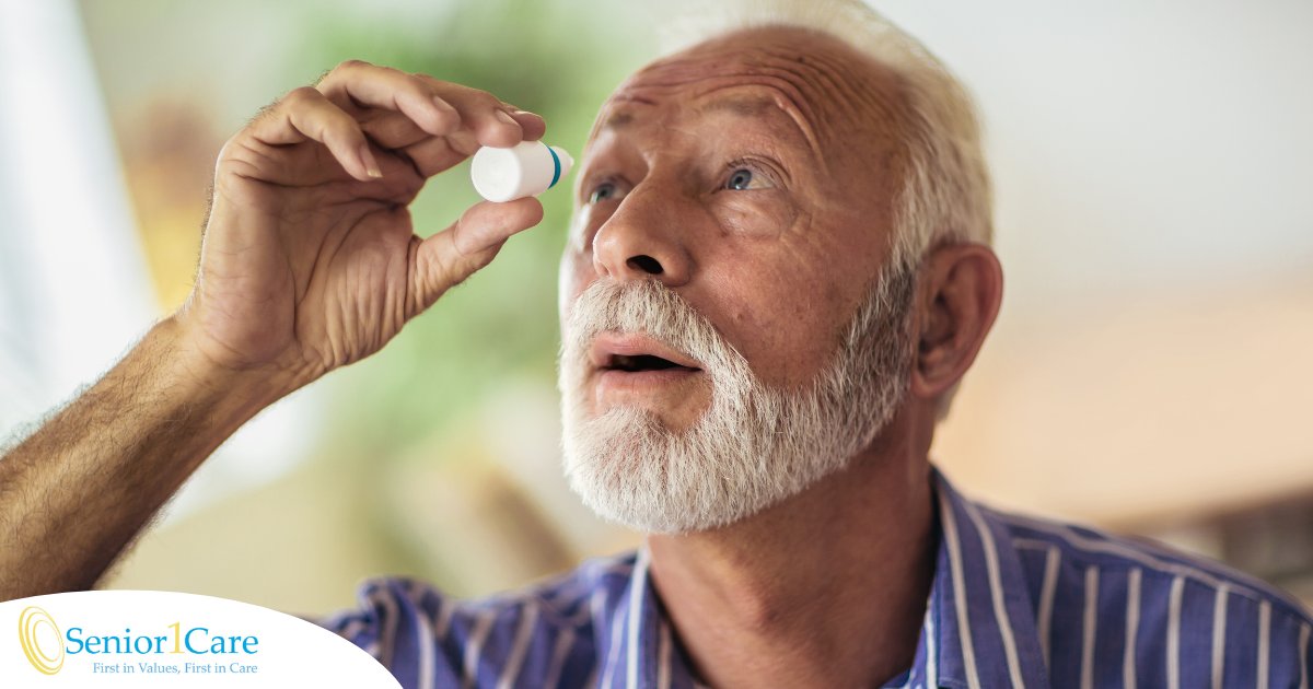 An older man uses eye drops as part of a good care routine to maintain his vision health.