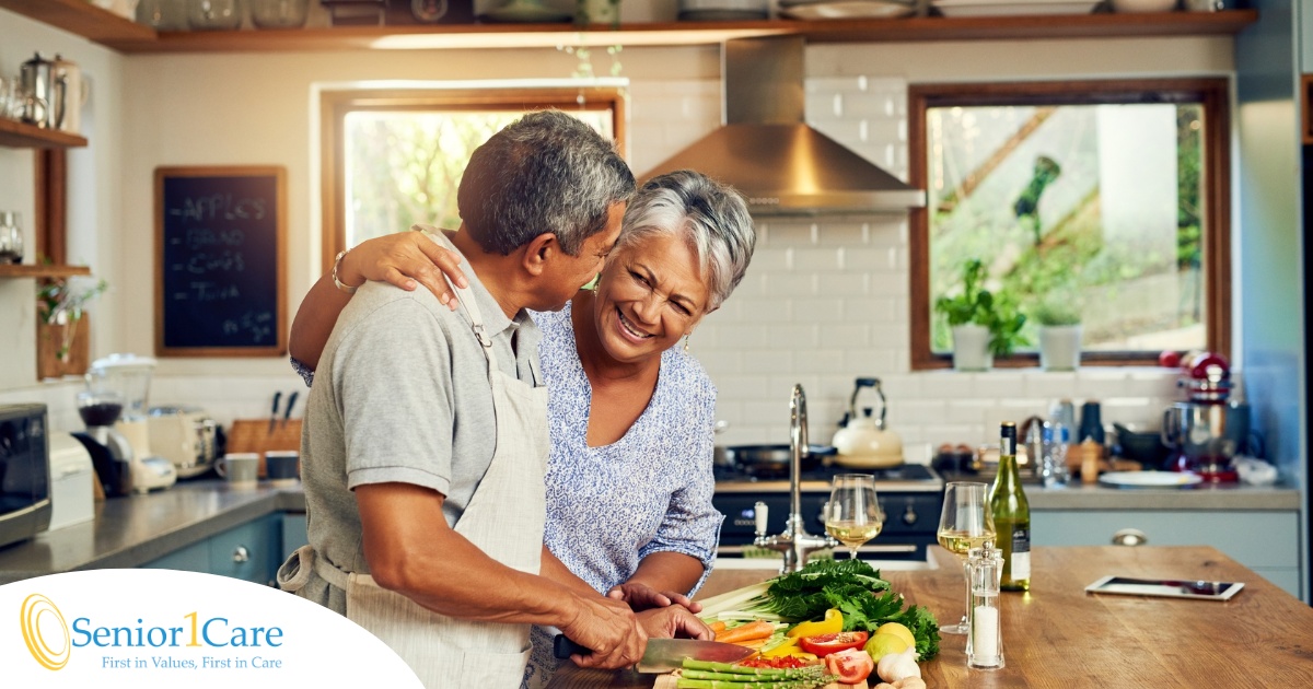 An older couple prepares healthy food together representing National Nutrition Month.