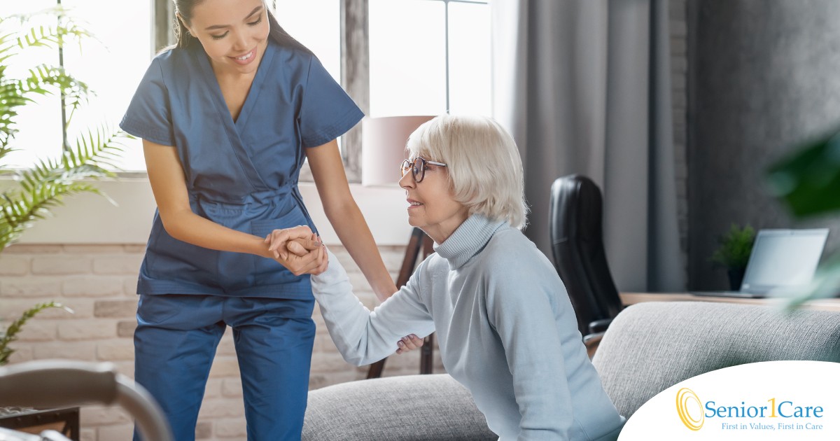 A caregiver demonstrates her caregiver skills by helping an older adult get up.