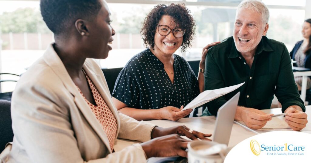 A couple talks with and advisor, representing the type of preparation that is crucial for successful senior care planning.