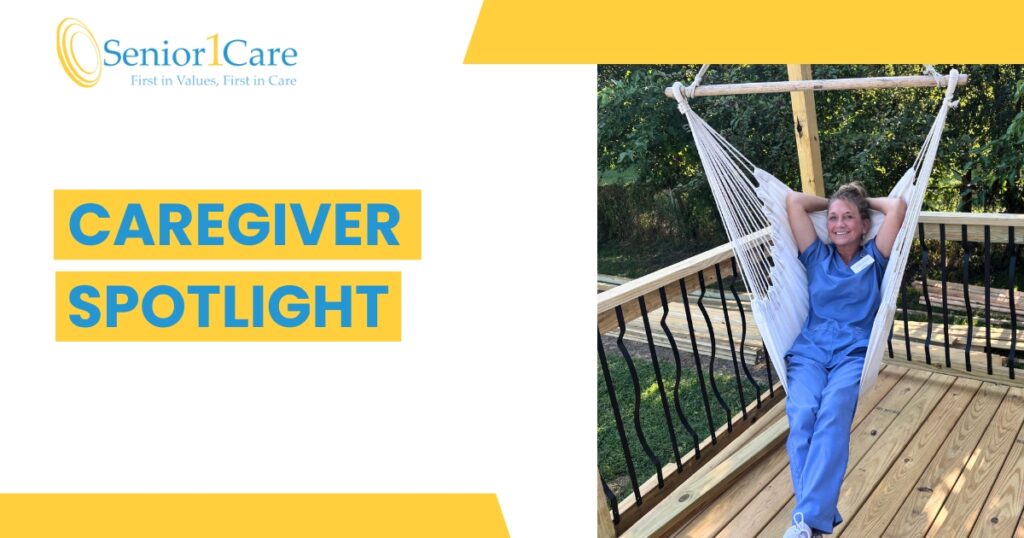 A smiling caregiver wearing blue scrubs relaxes in a white hammock chair on a wooden deck surrounded by trees. The image features the Senior1Care logo and text reading “Caregiver Spotlight.”