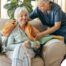 An aide provides home health care support for chronic conditions