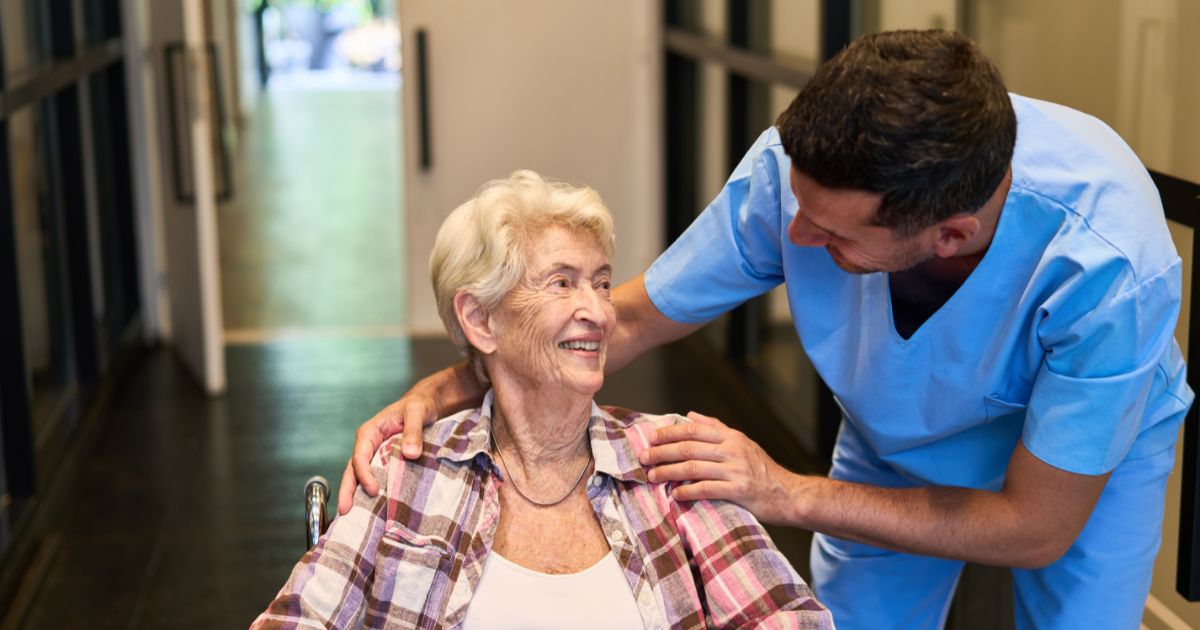 In-home caregiver assisting an elderly woman with companionship and mobility support in Huntertown