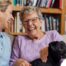 Through dementia care at home, a caregiver provides support to a senior.