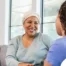 Senior woman benefiting from home care during cancer treatment.